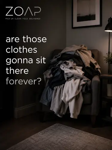 A pile of unwashed clothes on a chair, asking if it's time to schedule laundry pickup